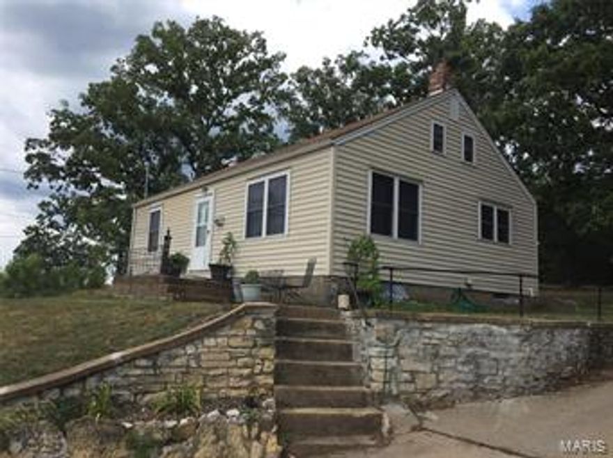 Rare opportunity on this Nice Location, on west side of town,  2 Bedrooms,1 Bath House,  Large livingroom/dining, hardwood floors, newer carpet bedrooms, large kitchen with dishwasher, stove, built in microwave. There is a Large 1 car attached garage off back of house. Unfinished basement and attic for storage , could be refinished into future living space.  Central A/C Heat Pump, added Insulation for comfort and efficiency. Home has a nice private setting with home backing to mature shade trees in the park. Appreciate Your Interest and questions to availability to Move in Quickly.