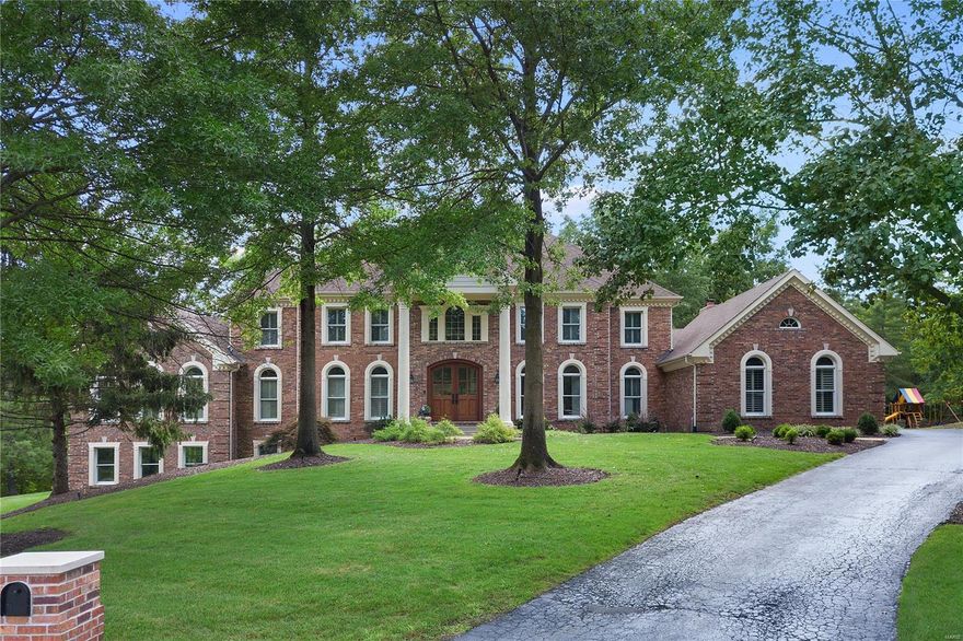 Comp Purposes Only! 
This home was totally renovated in the past few years.  All new kitchen and baths.  Smashing new main floor master suite with luxury bath and custom closet.  All New hardwoods on entire main floor and second floor.  High-end kitchen. Main floor laundry with custom built in lockers and a sep dog room.  Garage w/ paint and epoxy floor. Second flr boasts 4 large bedrms. 2 ensuite and on large jack-and-jill with a second floor laundry rm too.  Fabulous style thruout.  Finished walk-out LL with another bedrm and new full bath, large family rm w/ bar and frpl plus large rec rm for kids play or private office area. New systems and lots of other updates.  Recessed lighting added thruout.  New front door. New HVAC.  Large level lot.