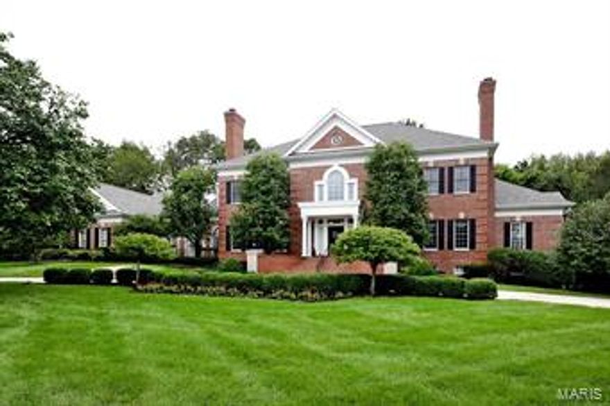 An amazing Johnson built home for the very discriminating buyer. It features every possible amenity including 3 family rooms, an enormous, remodeled first floor master suite on the first floor. The kitchen is a cook's dream and opening to 3 rooms with built-in catering facilities. The millwork is outstanding. The ceilings soar, there are 3 built-in bars and a beautiful paneled library in addition to all of the other entertaining rooms. The dining room is elegant and will accommodate at least 12 guests. The second floor has 4 additional bedrooms with baths, one of which overlooks the 2-story living room. The completed lower level is ideal for grand entertaining with a 3-sided professional bar.  There are multiple game rooms, exercise rooms, full bath, see through fireplace, and a thousand bottle wine cellar. Very attractively priced by comparison to other homes of this size. Over 7,800 square feet on a private acre in this exclusive subdivision of comparable finer homes.