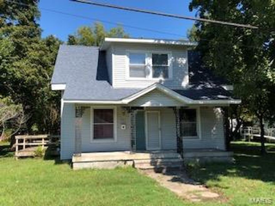 Great investment opportunity in this 3 BR, 1 BA, 1.5 story home with wood floors throughout except for ceramic in bath. Large kitchen with appliances (elec range & dishwasher), dining room with french doors that open onto the side deck. Main level laundry with dryer and main level master. Upstairs are 2 bedrooms and storage area. Covered front porch and partial cellar. Home sits on a nice level lot with pecan tree. New roof and decking in 2013. Seller was working on remodel and is leaving all the materials/supplies (some laminate flooring, paint, mud, & etc) so you can finish. This would make a great rental property if you're willing to put in the sweat and equity. 80x140 level lot with alley access. Additional Rooms: Mud Room