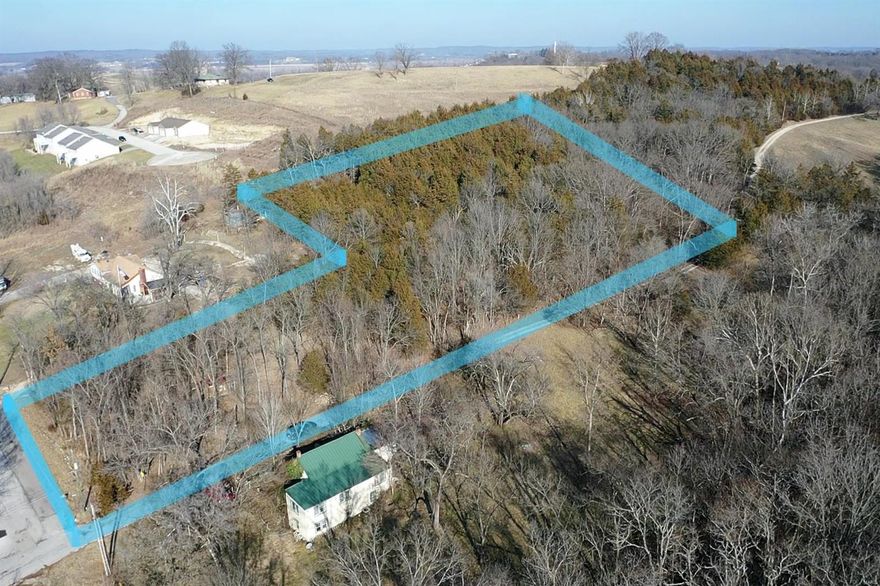 Looking for that large secluded building lot in Hermann that gives you the feeling of being in the country? This may be your property! Total of 14 full lots and 2 half lots included in this property with access to water and sewer. Tons of mature cedar trees providing you with a beautiful backdrop for your home or multiple cabins. Wildlife trails and deer rubs throughout the property add to mirage of being in the deep woods while still residing in city limits! These lots fall under Hermann's R-3 zone. Portion of the property borders the popular "Hermann Farm'. Perfect for residential homes or long-term rental housing. There is a possibility for guesthouse with the proper approval and permits from city. Call now for more information or to view this wonderful property! Note: Address shown is not actual address. Used only for locating property area.