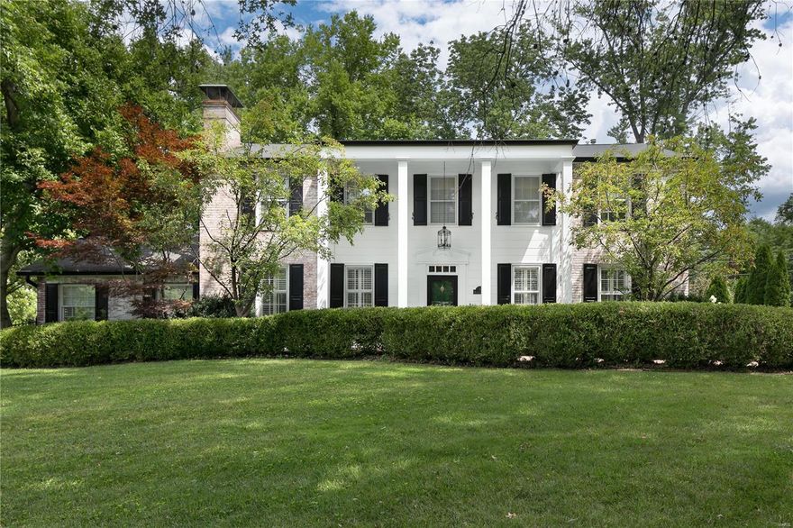 FABULOUS NEW PRICE!!!!!Wonderful, updated 2 story on charming Lane in the heart of Ladue. This updated 4 bed, 3 full 2 half bath gem blends classic elegance w modern luxury. The formal living room w fireplace, built in bookcases, hardwood floors & the formal dining room has beautiful bay window & hardwood floors. The kitchen offers stainless steel appliances, granite countertops, breakfast bar & opens to the Hearth room w 13 ‘cathedral ceilings w French doors out to the pool & patio. Adjoining the kitchen is the butler’s pantry/wet bar. 2 additional living areas on the 1st floor, a large den w built in bookcases and a light filled family room w beautiful floor to ceiling windows w French doors. Upstairs find master BR suite, walk in closet and 3 additional beds with 2 additional full BA and 2nd floor laundry room. The LL offers finished rec area, half BA & additional unfinished area for storage. Backyard has a pool with waterfall & grassy area for dogs & children to play. 2 car garage.