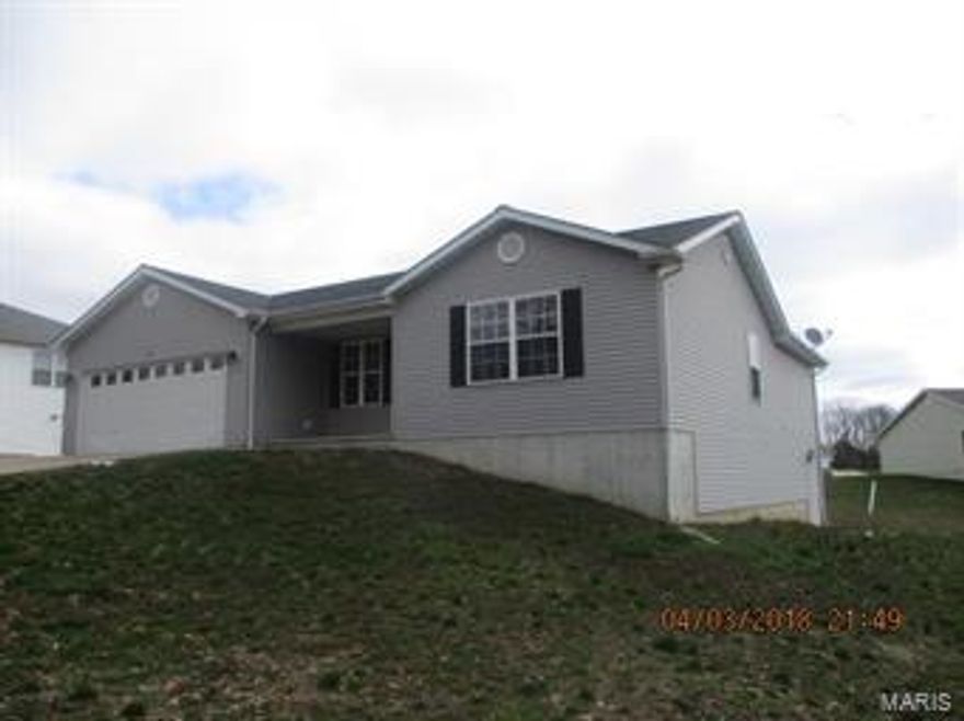 Home with 3 beds and 2 1/2 full baths. Walkout basement and 2 car attached garage.  New carpeting and paint .   Ready for your family .