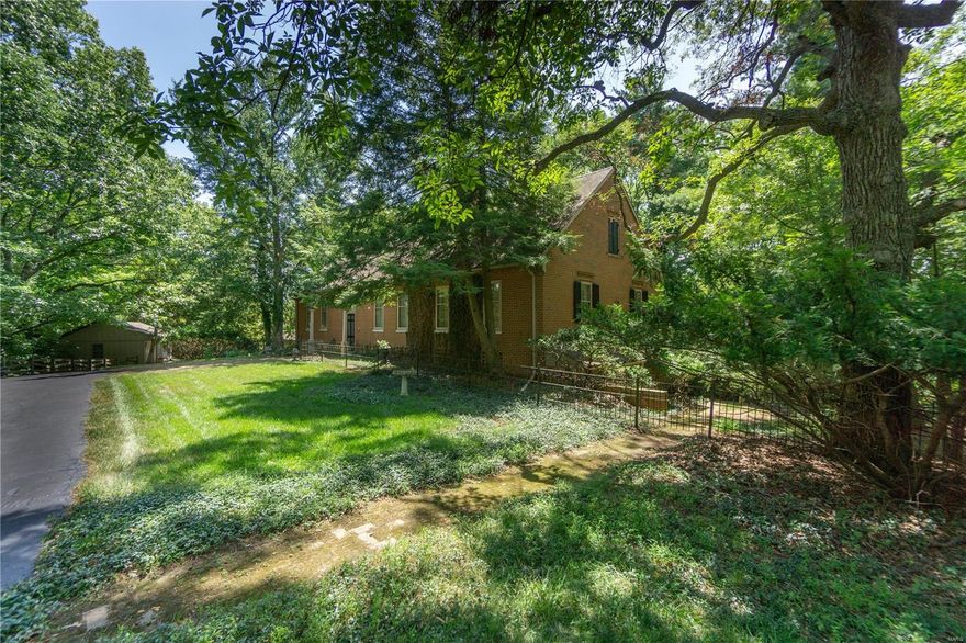 RETURN TO AN ERA OF GRACIOUS LIVING IN THIS FULL BRICK, COLONIAL-WILLIAMSBURG 2-STORY on 7.3 AC Designed by Arthur Johnson in 1955 on the original Kehr family farmstead. The Main Home, Guest House & Pool are surrounded with century old, forged iron fencing, brick walkways & patios. This lovely estate is in the Heart of Chesterfield, yet lives like a private nature reserve. 11 Room, 4Br/3.5Ba has wide plank, red oak flooring, 2 fireplaces, historic, locally resourced barn beams, brick flooring in breakfast room & butterie (pantry), plus a sunroom with tiles from Sicily. Spacious 2 room/1 bath guest house with garage & basement serves as changing quarters for pool & provides main floor space for office or hobbies. Suitable for horses, 3 acres with Kennelwood underground fencing is in place for pets. No subdivision indentures. BACKS TO "COUNTRY PLACE". LIST OF MANY OTHER SPECIAL FEATURES IS AVAILABLE ON A SEPARATE DOCUMENT. Adjoining 3 acre lot is for sale, listed at $399,000. Additional Rooms: Sun Room