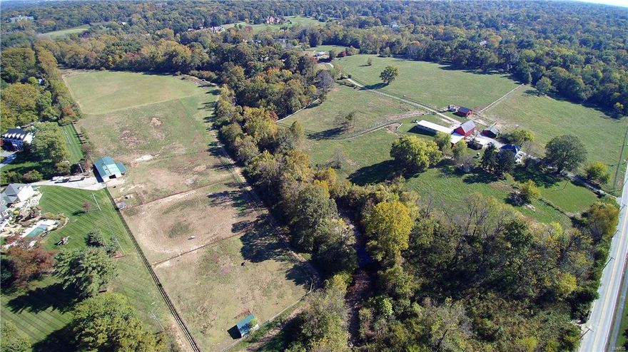 A rare opportunity in the City of Huntleigh located just a mile from Plaza Frontenac. This 68-acre equestrian estate includes a 4,500 sq. ft. home, caretaker/farmhouse, barns, multiple pastures, practice polo field & incredible views & topography. The property is surrounded by large estates, including homes on Squires Lane, Bridle Ridge Lane, Huntleigh Manor Lane & Radnor Road. Property is being sold with all improvements in "as is" condition. It can be divided with a combination of residential 3-acre & 2-acre zoning. The property is also accessible to the Ladue/Huntleigh bridle trails. Boundary and topographical surveys are available. The property includes 1710 N Geyer.