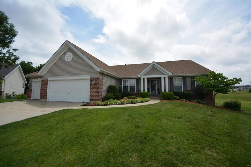 WELCOME HOME! Beautiful, MOVE-IN-READY 3BR, 3BTH custom ranch w/3180+SF of living space! Nestled in a quiet cul-de-sac on .41 level acre lot this home offers vinyl & brick front, lush landscaping & 3 car garage. The beautiful interior offers an open floor plan, fresh neutral paint, new flooring, newer roof & updates throughout. Beautiful entry foyer, elegant dining room, spacious great rm that features a gas fireplace flanked by tall windows. You'll love the eat-in kitchen w/custom cabinetry, granite countertops, bkft bar, SS appliances, pantry & bkft rm w/slider to the LG covered patio & level yard backing to open ground perfect for outdoor enjoyment. Luxurious master suite offers a walk-in closet & deluxe BTH w/dbl sink vanity, jetted tub & shower. 2 add'l bedrooms, full BTH & laundry on main. The LL is ideal for entertaining w/a LG rec rm w/wet bar, family rm, den/possible 4th BR & full BTH. Great location w/easy access to major HWYS, shopping, restaurants & AAA Wentzville Schools!