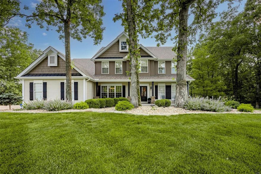 Resort style living in the heart of Wildwood! This spectacular 1.5 story, 6-bedroom home with more than 5300 sq ft of living space sits on a premium, private lot featuring a stunning saltwater pool with waterfall features, hot tub, firepits, outdoor kitchen/bar and all the extras. You will feel like you are vacationing when you step outside! This unique home offers an open, inviting floor plan with large custom kitchen featuring upgraded cabinetry, new backsplash, custom pantry and much more and opens to the light-filled hearth room and great room which both have access to the maintenance-free decks overlooking the lush backyard oasis. Main floor master offers deck access, updated bath and custom closet. Upstairs features 4 additional bedrooms and lower level offers another bedroom, bath, kitchen, rec room, gym, workshop and abundance of storage space. Pride of ownership shows in every detail from the upgraded exterior to the garage floor. Don't miss this incredible opportunity!