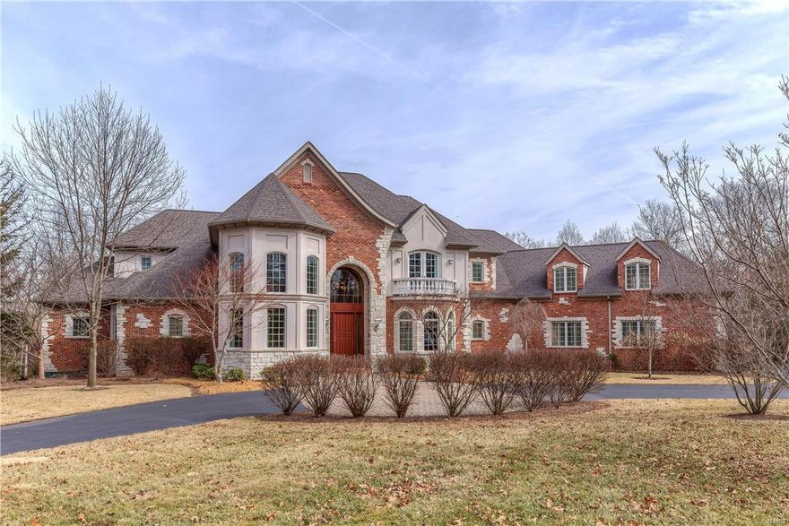 This spectacular 1.5-sty Estate home from designer Lauren Strutman redefines luxury living! Over 10,000 sf of living space enhanced by gleaming wood floors, distinctive architectural elements, 10’ ceilings & walls of windows. Grand 2-sty foyer leads to private study with glass-domed ceiling & wet bar, elegant dining room & stunning great room with fireplace. State-of-the-art kitchen featuring custom cabinetry, granite countertops & commercial grade appliances adjoins breakfast room, hearth room highlighted by fireplace & sunroom.  Sumptuous master bedroom suite offers an appealing retreat with lavish bath with Jacuzzi & 17’x10’ dressing room. Front & rear staircases access 3 additional bedroom suites plus bonus room with custom built-ins.  Walk-out Lower Level includes billiards room, office, workout room, 1 1/2 baths & recreation room that opens to outdoor living area with upper & lower terraces, pool & pool house. Impeccably landscaped 3-ac grounds with circular drive & 4-car garage.