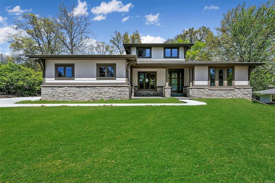 The Lucerne is one of McKelvey's Luxury Home Floor plans. It is a 4,130 sq ft story and a half home, with 4 bedrooms and 3.5 baths. The floor plan contains a luxurious master bedroom suite and master bathroom. The home features vaulted ceilings in the Great Room, making the space feel open to all who live there as well as a fireplace in the hearth room. The plan also features a library/office space on the front of the house. It also has a formal dining room for any occasion.