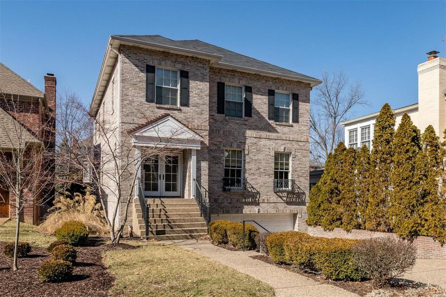 Stroll home from a wonderful evening out in Downtown Clayton to your luxurious home with over 4,000 square feet of living space. This meticulously maintained home has 10' ceilings, three fireplaces, wood flooring, high end appliances, breakfast room, open concept with kitchen overlooking the hearth room, floor-to-ceiling flagstone fireplace, wet bar, and 3-car garage. The finished LL has 9' ceilings, gas fireplace, family room and full bath. Light radiates throughout the home with windows and floor-to-ceiling french doors overlooking the backyard. This home is perfect for entertaining with the beautiful, oversized, deck and flagstone spa. The backyard is perfect for children to play or to build your dream pool. You will fall in love with this home the minute you walk in the door.  (Elevator can be installed into the home). Bid is available.