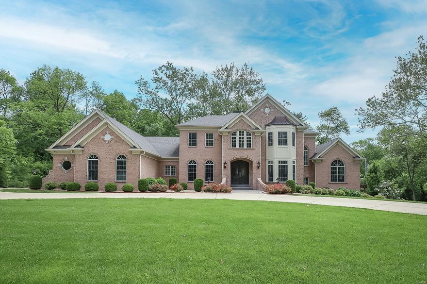 Spectacular, energy efficient (zoned geo-thermal HVAC) custom-built home featuring 6 Bedrooms, 7 Baths (5F/2H) with nearly 9,000 sqft of living space and is situated on a very private 1.28-acre lot, in the heart of Frontenac! Open floor plan, including Study/Office with custom built-ins, elegant formal Dining Room & gorgeous Great Room with box-beam ceiling, WB fireplace, custom built-ins, and a wall of windows. Professionally finished, walk-out Lower Level has over 2,600 sqft with huge Rec Room, gas fireplace, custom wet bar, Wine Room, Exercise Room, Game Room, Media Room with 3-tiered seating; walk-in sauna, 5th & 6th Beds & 5th full Bath. Highlights: 10’ plus ceilings, gorgeous Asian Walnut hardwood flooring, extensive millwork/moldings, alarm, irrigation systems, Beam vacuum system, circular drive driveway & oversized, 3-car garage. Relax outside on stamped concrete patio with built-in BBQ grill, outside fireplace and patio under the pergola! Perfect for entertaining! Additional Rooms: Mud Room