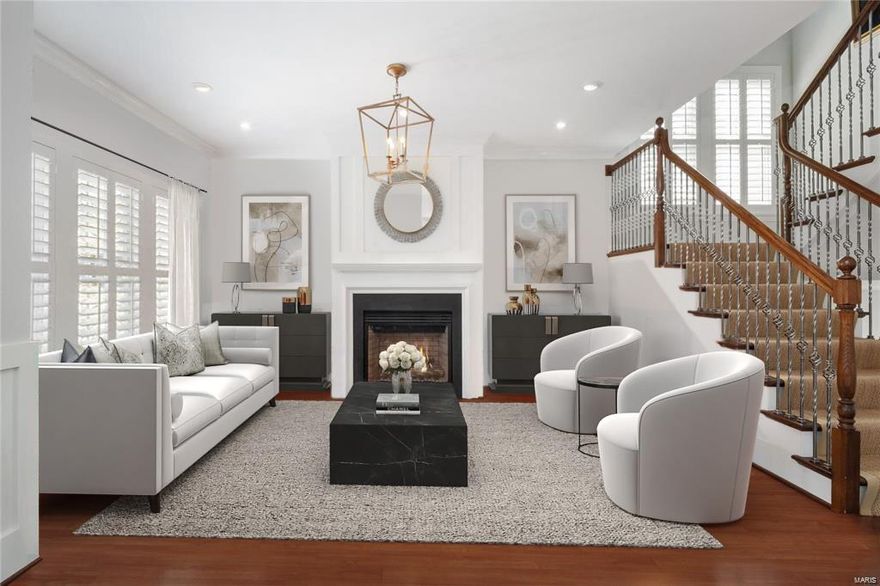 Located in the heart of Ladue, this 11 year New home was been meticulously maintained and upgraded with high end finishes throughout.  It rivals any brand new construction on the market today!  Upgraded hdwd flooring is found throughout the 1st flr, and most of the 2nd flr and lower level.  Gorgeous designer touches including custom built ins, wainscoting, rebuilt fp surround with slate (liv rm), custom plantation shutters, museum lighting (1st flr) and custom walk in closets.  Find a lg open kitchen with stainless appliances, center island and custom cabinetry, that flows seamlessly into the family/hearth rm with stone fp overlooking the lush backyard.  The 2nd flr features a master suite with spa bath and plenty of closet space.  A bedrm suite, 2 additional bedrms and jack/jill bath complete the 2nd flr.  The finished look out lower level offers the perfect space to spread out with large rec rm and half bath.  Professionally landscaped, this  home is roughed in for a future elevator