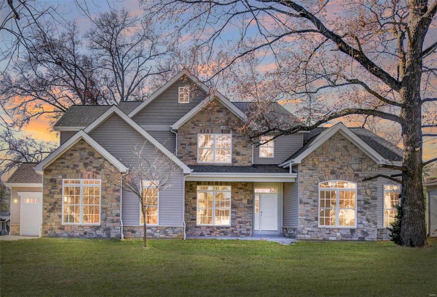 Exquisitely appointed thruout, this 1.5 Story new construction, is situated on a half-acre lot. It has great curb appeal, w/its 5-peak front elevation & stone accented façade. This 5 bedrm 4.5 bath, just under 5000SF of total living area on 3 levels, offers an open flr plan w/arched doorways & soaring ceilings on the main level. Off the Foyer is an Office & formal Dining Rm w/tray ceiling. The Great Rm offers a stone gas fireplace & opens to the patio & spacious yard. The Kitchen features GE Café appliances, white shaker cabinetry, quartz counters & lg center island. The Lndry/Mud Rm leads to the 3car garages. A main level Master Suite has a large spa-like shower w/multiple body sprays, rainfall shower head & separate soaking tub. The 2nd level has a loft/family rm, private ensuite Bedrm plus 2 add’l Bedrms sharing a Jack-n-Jill Bath. The finished LL has the 5th Bedrm, full Bath & lg Rec Rm This Des Peres home is located in highly sought-after Kirkwood School District. Additional Rooms: Mud Room