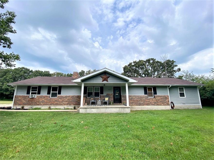 Remarkably renewed home that offers loads of space and beautiful finishes.  Offering over 2200 sq ft of living with 4 bedrooms, 2 baths, formal living, home office, mud room, oversized kitchen and living rooms.  All new Vinyl Siding and soffits, Electric, plumbing, heating, paint, trim and flooring this home is sure to please any buyer.  The oversized 1 car attached garge and the detached 4 car all situated on 1.34 acres on the edge of town make it the perfect getaway.  And lets not forget all the pretties that where done to this home, New Kitchen, barn doors, great back deck and patio, electric brick fireplace, all done in the unique updating you expect form this Seller.