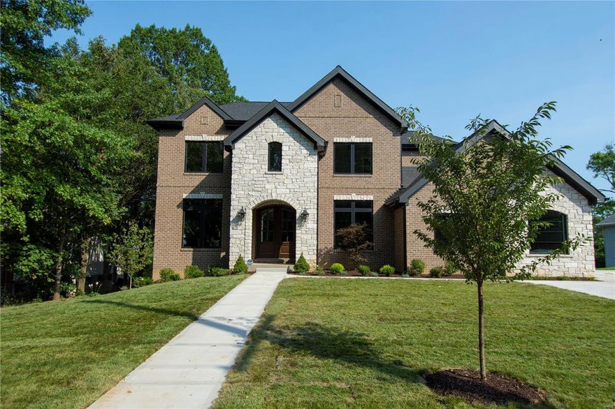 Est. 2019. New construction in Ladue Schools! Located on a large deep lot this gorgeous custom 1.5 story home features 4 bed, 4.5 bath, 3-car garage, high ceilings, open floor plan and is smart home enabled. HIGHLIGHTS INCLUDE: Main flr master and luxurious master bath with custom shower with 3 shower heads, his and her vanities, walk-in custom closet and stone vanity tops; designer kitchen with SS Wolf and Jenn-Air appliances, 42 inch custom white cabinets, large island, granite counter tops, walk-in pantry, and butler's pantry; stacked stone fireplace in spacious family rm; custom hardwood floors; beautiful Mertie trims throughout; laundry rm on 1st and 2nd flrs; Large backyard with composite deck AND patio; James Hardie siding, cement soffit and facia; landscaped and sodded with sprinkler system; lifetime foundation waterproofing system with exterior and interior perimeter drain tile with sump pit and pump. Too many features to list! Close to major hwys, restaurants, and schools! Additional Rooms: Mud Room