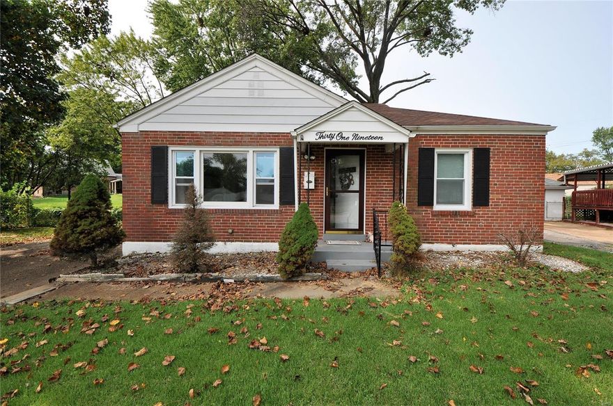 Beautifully updated, MOVE IN READY 2 BDRM, 1 BTH ranch home on large, level lot. Exterior boasts brick front w/covered porch & extended driveway w/detached 1 car garage. HUGE fenced in, level backyard w/patio & shed.  Open and gorgeous interior features beautiful dark stained wood flooring, newer windows letting in TONS of natural light & updated light fixtures. Spacious living rm/breakfast rm combo w/crown molding leads to stunningly updated lux kitchen w/granite counter tops, breakfast bar, 42" gleaming white cabinetry, stainless steel appliances including gas stove top, large ceramic tile flooring & atrium door to backyard. 2 bedrooms w/beautiful wood floors & updated full bath on main level. Full basement waiting for your finishing touches. Close to schools, highways, shopping and restaurants. Priced to SELL! MUST SEE!