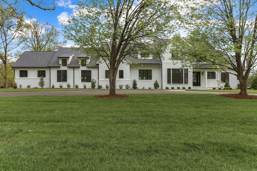 BRAND NEW CONSTRUCTION JUST FINISHED! This modern farmhouse is truly one of a kind- impressive millwork, built-in's, oak beams, designer lighting and hardwood floors throughout.  10' ceilings on the 1st floor and an abundance of light create a warm environment.  1st floor master suite features oversized custom closets, grand master bath, shiplap paneling, heated Carrara marble floors and free standing tub.  The gourmet kitchen hosts custom cabinetry,  Thermador appliances and Carrara marble counters - open to the breakfast room, walk-up bar and Hearth room with 14' vaulted ceilings.  A study, large living rm, mud/laundry area with multiple closets and 1/2 bath finish off this great 1st floor.  The 2nd floor with 9' ceilings hosts 3 bdrms all en-suite and a 2nd laundry room.  Other highlights include the oversized 4 car garage that must be seen, covered front and rear porches, and large private backyard. Additional Rooms: Mud Room