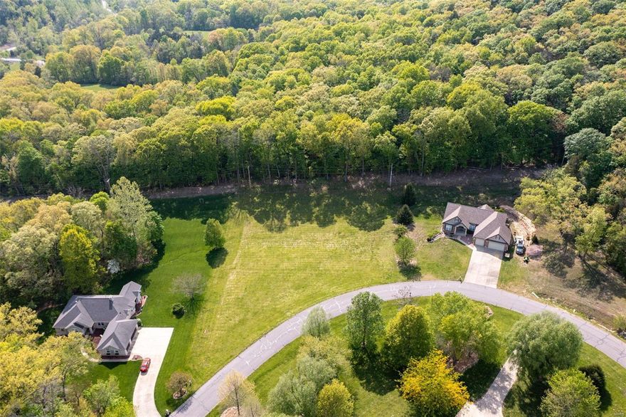 Beautiful 1.15-acre lot in Augusta Shores with rare level terrain and backing to dense woods, offering complete privacy for your future home. Enjoy close proximity to community pool, tennis courts, picnic pavilion, and Berg Lake - one of four spring-fed, stocked lakes in the area. This gated community allows for a level driveway and has no time limit to build. With access to the Katy Trail for hiking and biking, and 260-acre Klondike Park across Hwy 94, outdoor activities are abundant. The location is just 15 minutes from I-64/40 and perfect for exploring the stunning Augusta wine country. Additionally, this community offers a clubhouse, public water and sewer, underground utilities, fishing docks, streetlights, 233 acres of common ground, snow removal for private roads, and an abundance of wildlife. Recently added 1G fiber optic Internet with router, now included in yearly assessment. Lot is already excavated and ready to build on, pending utilities. Additional Rooms: In Platted Subdv.