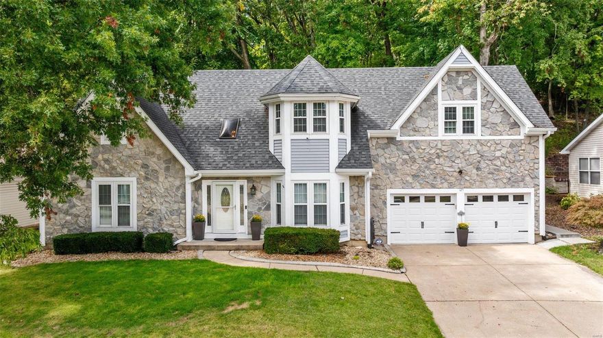 Motivated Seller! Price Improved! Stunning curb appeal and tons of updates to this 1.5 story home with main floor huge primary suite. Grand 2-story entry foyer and 2-story Great Room with fireplace. The updated kitchen has 42" custom cabinetry with crown and pull-out shelves, SS appliances, stone backsplash, built-in granite center island and granite table seating area. Formal Dining Room with engineered wood flooring, tray ceiling and a beautiful bay window. The primary En Suite has a whirlpool tub and separate shower, updated double bowl vanity and 2 walk-in closets. These 4 huge bedrooms with walk-in closets will please the entire family. Open loft upstairs for space to spread out and a lake view, plus the 4th bedroom is vaulted and huge 22x18 - perfect for a gaming room, second family room, huge office, or whatever your imagination can dream of in this cool space. UPDATES in the past 1-5 years include new windows, dual HE Heat Pump HVAC's, water heater, LED trim lighting & more.