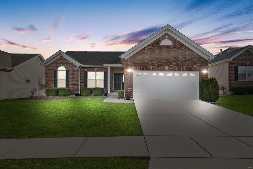 This adorable ranch with a NEW (Dec 2020) roof has soaring vaulted ceilings & an open floorplan you will love! The cozy family room w/gas fireplace & lots of warm natural light flows into the kitchen w/42" cabinets w/roll-out trays, SS appliances, breakfast bar, & pantry, & dining room which opens to the patio in the level back yard. Down the hall are 3 bedrooms w/9' ceilings, including the primary suite w/walk-in closet w/custom organizer & private bath w/dual sinks, jetted tub & separate shower w/rain can showerhead. Main floor laundry has a counter for folding & storage cabinets. Security system w/wired fire alarms, motion sensors, glass breakers, & door/window sensors on both levels. Huge LL w/egress window & roughed-in bath provides excellent storage or could be finished to your taste. Lovely, level, landscaped yard. Beautiful neighborhood near Mid Rivers' shopping, dining, & conveniences (including the Rec-Plex) + Ft Zumwalt (East High) Schools. Easy access to I-70. See it today!