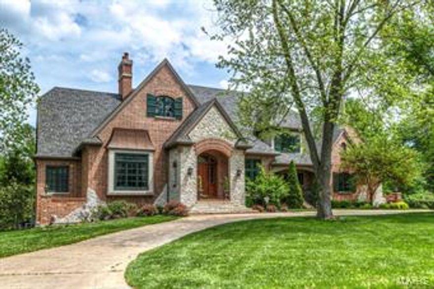 Spectacular 1.5 Sty French Country Manse on gorgeous 1-ac lot! Over 8000 sf of living space enhanced by hand hewn & oak flooring, extensive millwork, architectural ceilings, French doors & 3 fireplaces. Elegant octagonal foyer opens to paneled library w/ custom built-ins & dining room w/elaborate molding & sculpted ceiling. Stunning GR w/ 14' ceiling, fireplace flanked by arched bookcases, wet bar & wall of French doors opening to veranda. State-of-the-art kitchen features granite counters, 42'' cabinetry, professional quality appliances, planning center & butler's pantry. Adjoining breakfast room & hearth room with fireplace provide a relaxing gathering place. Coffered MBR wit His & Hers walk-in closets & marble bath with Jacuzzi. 3 additional BR's, 2 Jack n' Jill baths + rec room complete the family quarters. Walk-out LL with its own ''Irish Pub'', wine cellar, theater, guest suite, exercise room & eat-in kitchen. Grounds include pool, patio with fire pit & 4-car garage.