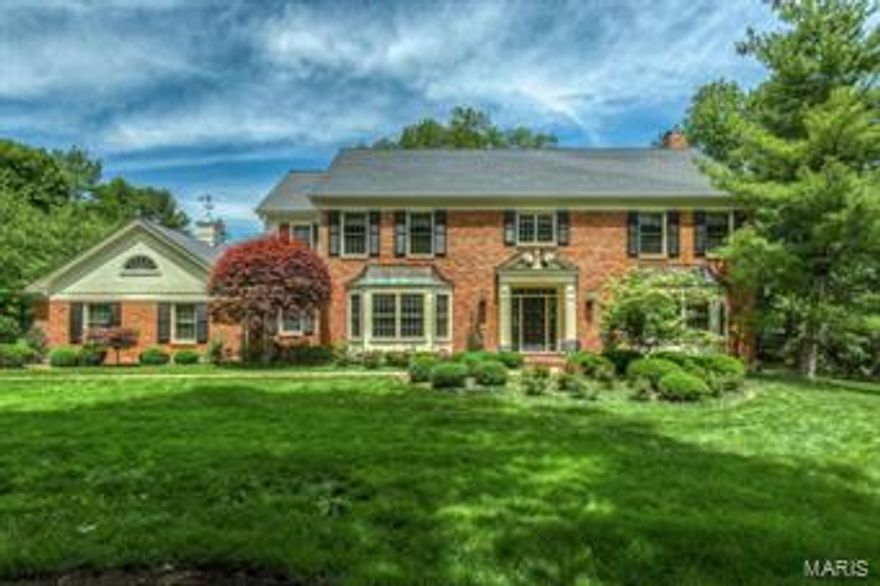 Spectacular 2-Sty Colonial in prestigious Wheatfield! Custom-built Grotpeter home distinguished by extraordinary craftsmanship & updates throughout! Gracious hardwood foyer opens to elegant living & dining rooms with bay windows & extensive millwork and library-paneled family room with beamed ceiling, granite fireplace flanked by built-in bookcases, wet bar & French doors that walk out to patio. Fabulous kitchen with 42” cabinetry, granite countertops, professional quality appliances & center island with breakfast bar adjoins light-filled breakfast room with bay window & planning center. Sumptuous master bedroom suite with 2 walk-in closets, sitting area & updated bath provides an appealing retreat. 3 Large additional bedrooms & 2 full baths complete the 2nd floor living quarters. Professionally finished Lower Level features huge recreation room with wet bar, hobby room with custom built-ins, family room & full bath. Parklike 1+ acre grounds include patio, deck, gazebo & 3-car garage.