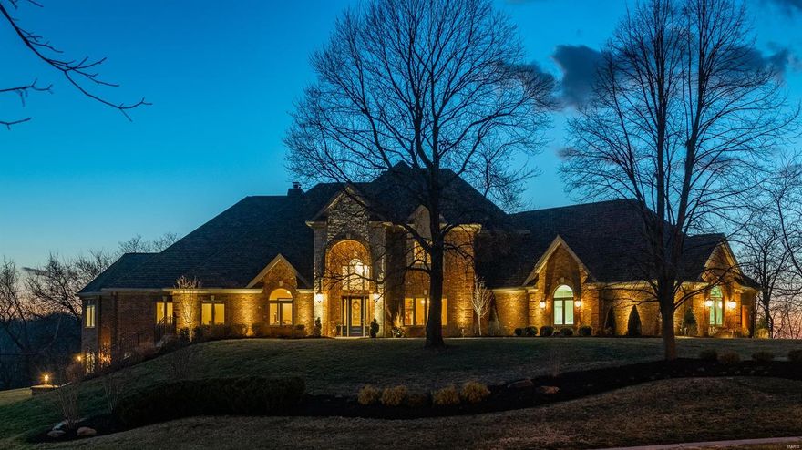 See attached Mktg Remarks,Special Features and Upgrades for a full description of this exquisite property. Custom built 6-year new 1.5 story belongs in Architectural Digest. Integrated sound and security systems. 2 story entry. Dining rm: walnut floors & butler pantry. Office: walnut floors & custom cabinet. Great rm: gas/wood burning fireplace w/surround, flat screen TV, walnut floors. Kitchen: open to hearth room & eat-in kitchen. Hearth rm: stone fireplace, flat screen TV, walnut floors. Kitchen: custom cabinets, breakfast bar, granite counters, top-of-line appliances. Mn fl master suite:sitting room w/windows overlooking lake. 2 mstr baths, walk-in closets. Main floor 1/2 bath, cedar closet, laundry rm & granite counters & 4 car heated garage w/1/2 bath. Upstairs: 3 bdrms w/baths & walk-in closets. Lower level features: 2nd kitchen, 2 fireplaces, 2 seating areas, huge rec room, theatre rm, work-out rm, security vault rms & 5th bdrm. Home has over 13,000 sq. ft. of finished space. Additional Rooms: Mud Room