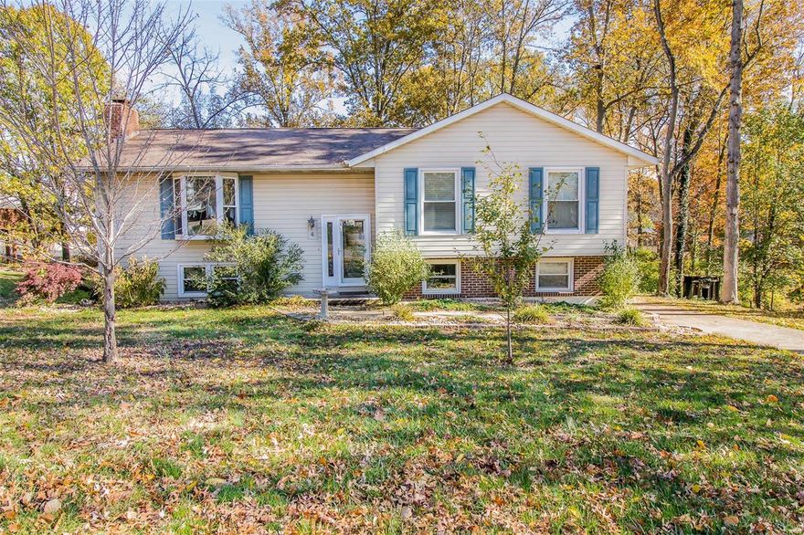 Welcome home to 4 Buckingham Drive! Family-friendly spilt foyer features 3 beds, and 2.5 baths. The main floor boasts a bright and airy open floor plan, great room, hardwood floors, expansive eat-in kitchen, breakfast bar with granite countertops, Quartz counters, updated cabinetry, pantry, and sleek subway tiled back-splash.  All kitchen appliances will stay! The enclosed sun porch makes way to the spacious concrete deck perfect for entertaining family and friends on! The lower level has been freshly painted and offers up a cozy family room with built-in bookcases and wood burning stove. Bring your ideas for two bonus rooms that could easily be finished for a 4th bedroom/office/gaming or craft room. So many extra amenities here like the park-like, level backyard, the awesome subdivision pool and so much more! Easy to find and close to Hwy's 47 and 100 for the commuters, makes this a great place to live! Hurry now to be in before the holidays! Contact an agent TODAY!