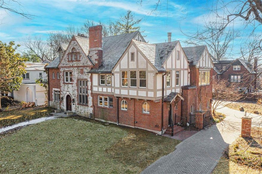 Located in historic University Hills is this impressive home that has been updated with a substantial addition bringing the total living space to over 7,600 sqft.  Recently, the home has had a substantial refresh including some new systems, electrical, refinished flooring, painting, & more. As you enter the stately home, you will be enamored by the marble foyer & staircase. The living room is expansive featuring a wood-burning fireplace & original built-ins. Formal dining room. The kitchen featured custom wood cabinets, granite counters, doubles of all appliances, & an adjoining mudroom/laundry. There is a charming breakfast room for casual dining. Additional livings spaces on the main level include a family room & a game room with a spiral staircase. The primary bedroom is spacious with a large spa bath & an adjoining office. The 2nd floor features a guest suite, 3 more bedrooms & 2 full baths. 3rd floor with additional bedroom, full bath & library. 2-car garage. Paver stone driveway.