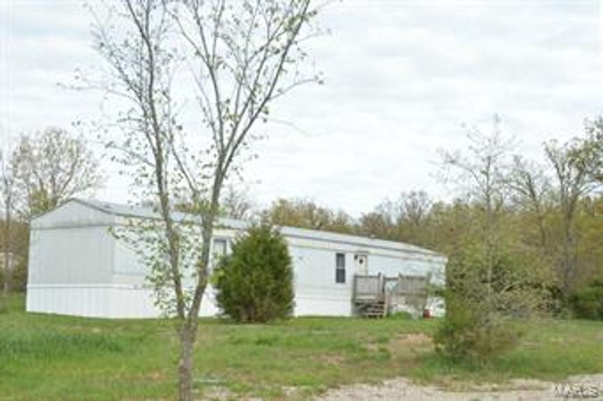 This is a nice starter home on 4.92 acres.  It is in Dallas County but is in the Conway School District.  Nice wooden 10x12 shed stays with property. Nice fenced garden space.