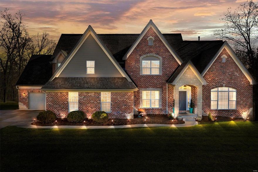 Why wait for new construction when the home of your dreams is ready NOW. Gorgeous 1.5 story estate sits on 3 acres of beautiful yard surrounded by trees, offers over 5,200 sq ft of living area, & is built to impress. Main floor features hardwood flooring, 9 ft doors, remodeled kitchen, hearth room, breakfast room, formal dining room, & 2 story great room. Main floor Owners Suite is incredible has a massive walk-in closet, separate tub & shower, & dual vanities. Upper level has a loft, 3 large bedrooms, one en-suite & a Jack N Jill bath. Walk out lower level has 5th large bedroom, full bath, family room/rec room with fireplace, wet bar, a gym which could easily be used as bedroom #6 or an office, & 2 storage areas. Home has an oversize 2 car & oversize 1 car garage.  Brand New carpet just installed & freshly painted interior. Stylish new light fixtures. Stunning w/ 3 gas fireplaces, tankless hot water heater, & EXTENSIVE crown molding, ELECTRIC CAR CHARGING STATION IN GARAGE