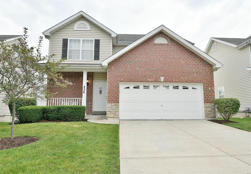 Absolutely beautiful free standing 2 story situated on a level lot with patio. Great curb appeal with Brick and Vinyl Siding, covered front porch and 2 CAR garage!!! The gorgeous interior offers a spacious open floor plan with a woodburning fireplace. The living room provides great natural light from the bay window. The kitchen showcases 42' cabinets, gorgeous countertops and a GAS stove!!! The refrigerator will stay as well.   Take a walk upstairs to the master bedroom, master suite, two other bedrooms and the other FULL bathroom. As an added bonus the LAUNDRY is upstairs as well and the washer and dryer will stay with the home too!!! The lower level is partially finished with a built in perfect for family movie night!!! There is an additional bathroom in the lower level as well. Want the joys of living in a home without the stress of landscaping??? This is the perfect home for you!!!! Schedule your showing today!!!
