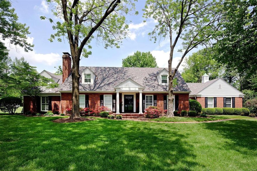 NEW PRICE! NEW PICS! FRESH NEUTRAL PAINT THROUGHOUT! This attractive 1.5 story home is situated on an acre lot in the heart of Ladue. 2 sty entry foyer w/slate tile flr opens to light-filled formal liv rm w/gas frplc & built-ins. Din rm has bay window & swing door leading to fabulous kitchen w/center island, granite & custom cabinetry. Lrge vaulted breakfast rm off kitchen opens to cozy sitting rm w/ skylights & beautiful views of the tiered deck w/pergola & saltwater pool. Family rm has wet bar & gas frpl. Main flr master suite has walk-in closet,  separate door leading to back deck & attached office. Access the 2nd flr w/ front & back stairs leading to 4 spacious bdrms, 2 updated bths & a loft area perfect for the kids.  The LL offers a lrg rec rm w/gas frplc, play rm, full bath & laundry rm.  Gleaming hrdwds, plant shutters, built-in lockers in mudrm, plenty of green space. Newer roof/ maintenance free deck & pergola/ updates to pool & 2 new baths upstairs. New floor in LL.