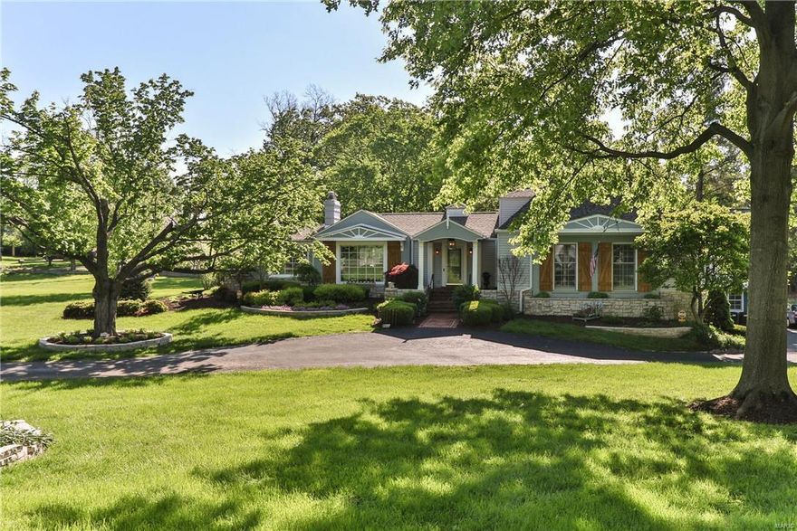 Beautiful Country Estate located in the sought-after Country Life Acres Neighborhood.  A wonderful gated community with a warm friendly feel. It will be more than just the charming curb appeal and large level beautifully landscaped 2 acre lot that wins you over.  There have been so many updates in the last four years.  The home offers a fabulous floor plan and updates at every turn. 
Beautiful new hardwood floors throughout.  The wonderful designed updated Kitchen with granite counter tops and custom cabinets are amazing. Large family room with built in shelves as well as gas fireplace.  The ceiling has been vaulted to reveal the wood beams and exposed brick. Den features fireplace, wet bar and french doors that lead to private deck with pergola.  MBR with huge new walk-in closet, bay window and an unbelievable updated bath with dual shower heads as well as the beautiful copper soaking tub.  The 2nd floor has an awesome new Teen suite with new private full bath.  Nice finished LL.