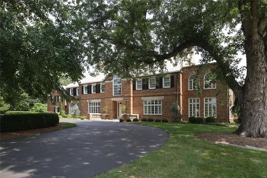 One of Maritz & Young’s finest colonial homes located in Ladue on a 3.13 acres. Beautiful level property w/pool. 9,500 sq ft home with all brick elevations, slate roof, copper gutters, 5 car garage, and double wide circular drive. Exceptional architectural features throughout the house. Intricate moldings, herringbone flooring, arched French doors, 10’ ceilings, five fireplaces. Foyer, floating circular stair, landing with stunning 10 foot arched window 12’ domed ceiling and intersecting center hall with groin vault ceiling provide direct access to all main rooms and the kitchen hearth room. Two story sun room extending from the living room on the South end of the house is spectacular. Upstairs Master Suite accessible by elevator with his/her dressing rooms & baths, five additional family bedrooms, large second floor laundry room, exercise room, & plenty of storage. Splendid yard with 20’x40’ pebble sheen pool, 60’x 60’ terrace & pool deck. 

Exclusions listed on feature sheet. Additional Rooms: Sun Room