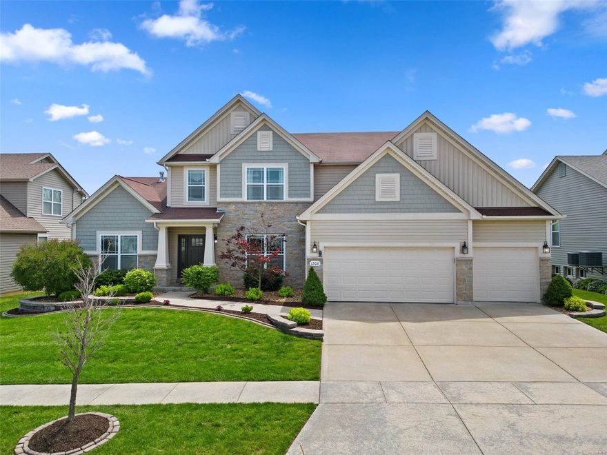 As you pull up to this lovely 1 1/2 story McKelvey built home you will notice the amazing landscaping immediately. The gourmet kitchen w/ gas cooktop, double oven, granite countertops & tile backsplash make this a cooks dream, check out the walk in pantry. This home offers plenty of room for any family to spread out w/ 4 living areas. The main floor owners suite w/ luxury master bath and large walk in closet is a private oasis for sure. 3 additional bedrooms & 2 full baths on the 2nd floor w/ a large bonus room for other family members retreat to. The lower level has been professionally finished w/ an amazing wet bar, a large family & game room and a private home office or additonal sleeping area & another full bath. The lovely backyard offers an oversized covered patio and backs to common ground, it also offers ample green space to play your games. Top this off with the 3rd car garage and you have your dream home. This home is a 1 owner 9 year old home. Agents related to sellers. Additional Rooms: Mud Room