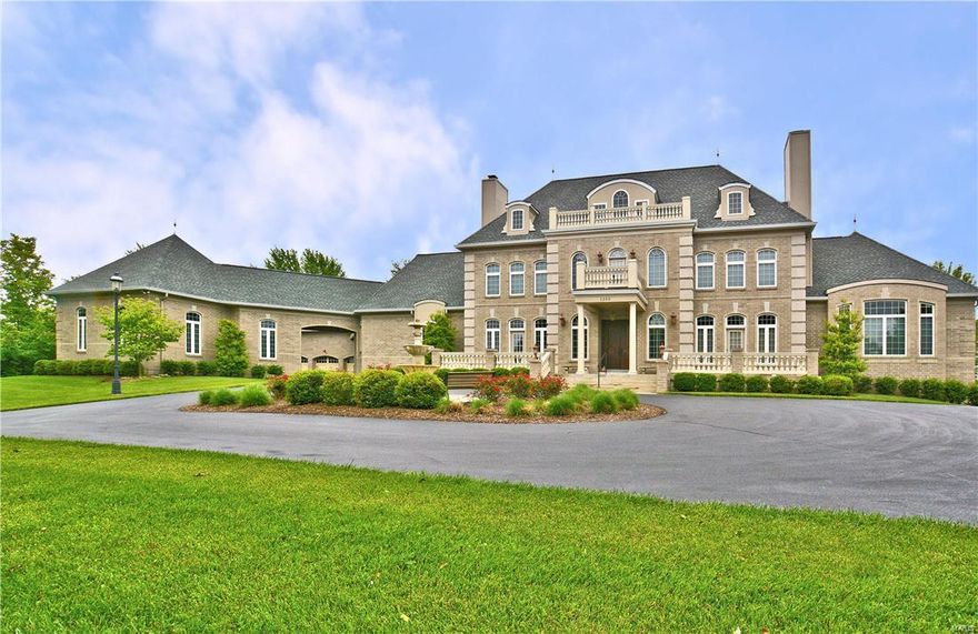 This one-of-a-kind amazing custom home with over 7,000 square feet of living space is first time on the market for a family who is looking for just about everything you would desire in a home.  It is an all brick French style Chateau home that comes with 7 oversize garage spaces. It has geothermal zoned heating and cooling, and energy efficient low-e argon commercially tinted windows which equates to very reasonable utility bills. The list just goes on and on.  His and her master bathroom suite, a custom kitchen with modern cabinetry, and high end appliances and built-in refrigerator.  All granite counter top surfaces in kitchen, bathrooms and laundry room. Some slate flooring, marble flooring, and hand scraped wood plank flooring.  Whole house music system, 10 foot deep pour foundation, extensive mill work and built-ins, two custom curved staircases. Second kitchen, bath and in-law suite, theater room, 600 amp electric service, inside elevator, in-ground saltwater pool, new roof, wow!