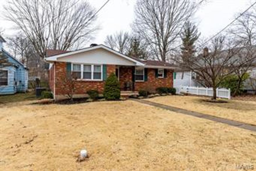 Centrally located on West Main Street in Festus. Within walking distance of parks, shopping & shopping. Pride of ownership shows throughout this home! Lush gardens are one of the many highlights of this property! In the spring you will think Shaw's garden has been moved to your backyard! Aggregate sidewalk leads you to the full brick home. Large living room includes crown molding & wood burning fireplace that was converted to gas. Some of the rooms are currently carpet but have original hardwood floors underneath. Open kitchen with all appliances staying, hardwood flooring & adjoining breakfast room. 2 spacious bedroom & 1 updated full bath with walk in shower. One of the bedroom closet was converted into a main floor laundry, but the hook up for the washer and dryer is also available in the lower level. Unfinished lower level with unlimited possibilities here. Large detached garage with adjoining carport. Perfect for parking cars or outside bar-b-que, great place for entertaining.