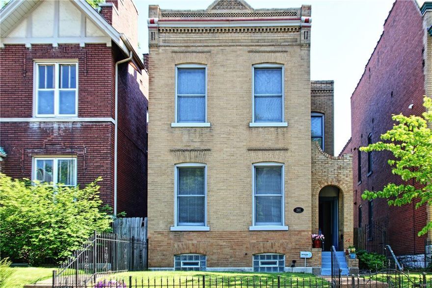 As you approach this home the first thing you see is the amazing wrought iron fencing.  This historical detail is becoming more rare to find.  The home features include 2 bedrooms, 2 bathrooms, a living room, dining room and newer kitchen (2014).  The living room has custom original mill work and newer builtin bookcases.  The kitchen has 42" cabinets with a coffee finish and granite countertops.  Upstairs are two bedrooms and a family bath.

This home has a nicely sized front and back yard.  The back yard has wood privacy fencing and a one car garage.  This back yard is an amazing entertaining space.  

Close to everything, if you work downtown you will be home in minutes.  No more sitting on the highway!  

No show til open house on Sunday May 22, 2016.  1-3pm