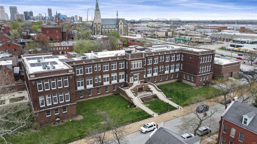Exquisite Trophy property in the heart of Soulard***36 loft-style apartments in an iconic Ittner-designed former school building***Existing Fannie Mae financing to be assumed - 3.62% interest with 8.5 years remaining - well below current market rates!***Gracious entryway and hallways with impressive scale and elegance - feels like a quality hotel***top-to-bottom renovation in 2017, loft-style apartments with 10-12+ foot ceilings, huge windows providing ample natural lighting, refinished concrete and original hardwood floors, original built-ins from former school days, designer lighting, gym, numerous outdoor spaces on the 1.59 acre lot. Solar panels reduce building electric costs, 33 car gated, secured parking lot plus the nicest 11 car garage you'll ever see. 18.43% projected 10 year IRR with existing loan assumed. 6.21% cap rate and 10.87% cash-on-cash on Y1 proforma. 6.15% cap on May RR.  Add in-unit laundry to boost cash-on-cash returns into the 13-14% region. Qualified buyers only