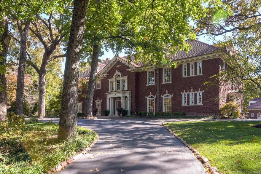 Magnificent 3-story Georgian Colonial built in 1914 by Charles B McCormack & Son situated on a gorgeous 1.23 acre lot in one of the most prestigious neighborhoods in STL.  Outstanding architectural design & detail from floors to ceilings provides both elegant entertaining and comfortable every day living.  The grand foyer includes an open staircase w/ balcony & stunning chandelier & opens to the dining rm with french doors leading to the patio.  The formal living room joins a light filled sun room. Top-of-the-line kitchen & breakfast room opens to the wood paneled den.  A butlers pantry, 2 powder rooms & mud room complete 1st floor. Upstairs, a gracious master suite w/walk in dressing closet & sitting room with fireplace, updated master bath, 3 bedrooms, 3 baths, laundry & fitness/5th bedroom. 3rd floor offers a 6th bdrm, rec room & 7th bdrm/office. A covered brick patio offers serene views of the grounds & pool.Finally,a fabulous apartment on the 2nd floor of the 3-Car carriage house. Additional Rooms: Sun Room