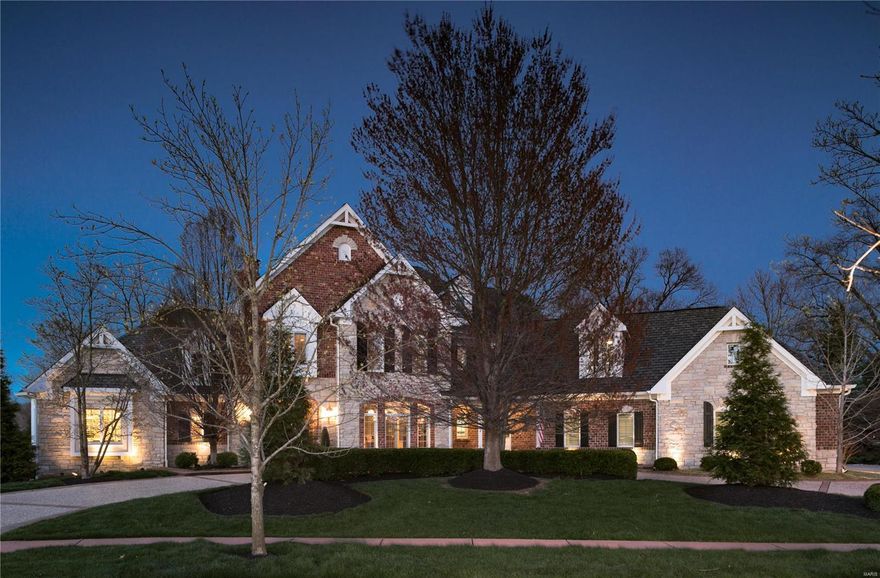 Fall in love with this impressive and immaculate 4 bedroom,7 bath executive home in an ideal location that offers gorgeous design features with exceptional quality and attention to detail throughout. This home showcases hickory wood flooring on main level, premium crown moldings, 10' ceilings, a stunning great room with a 20' wall of windows, plus 2 spacious custom offices. You'll love the chef's appointed eat in kitchen with designer appliances, custom cabinetry, wet bar and large walk-in pantry. There is a vaulted hearth room, a wonderful screened-in sunporch and an expansive deck that overlooks the beautiful landscaped yard. First floor master suite and luxury bath complete the main level. There are 3 bedrooms up, each with an ensuite bath and walk-in closet, a complete gym and special bonus/loft area. LL offers a state of the art media room, bar/kitchen, living area, full bath, exec office and exceptional storage. Oversized 4 car garage with custom storage. This home is a MUST see!