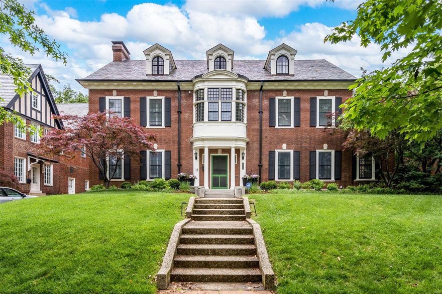 Introducing this light-filled 1912 Georgian home on gorgeous Cecil Ave.  Over 5,000 sqft of living space, including a welcoming living room w/ a large fireplace & built-in shelves; a dining room whose wall of windows and custom woodwork makes a comfortable backdrop for any size gathering; and a large eat-in kitchen w/ a center island. A screened-in porch overlooks a salt water pool & landscaped yard, perfect for wiffle ball. The backyard also includes tetherball & a basketball hoop. Back inside at the top of a sweeping staircase, the second floor has two bedrooms, each w/ en-suite baths; a primary bedroom w/ a remodeled bath; and an additional room w/ dramatic windows, detailed woodwork, and built-in shelves that can serve as an office or family space.  The third floor has three more rooms that can be used as bedrooms, home offices, and/or living spaces.  It’s a lovely location in all seasons: walk to Forest Park, DeMun restaurants, Washington University, and Clayton schools.