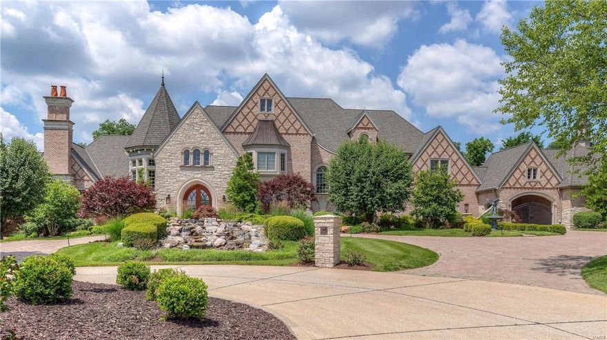 Architecturally significant home in premier gated neighborhood! Extraordinary craftsmanship, superb architectural finishes & high tech integrated systems. 2-sty foyer highlighted by dramatic floating staircase opens to paneled library w/ limestone fireplace, exquisite dining room & spectacular great room w/ wet bar & hand-carved fireplace. Exceptionally large kitchen has professional quality appliances, custom-built-ins & limestone flooring that flows into the adjoining breakfast room & hearth room. Barrel-vaulted master bed suite w/ stone fireplace, dressing room & beautifully appointed bath. The 2nd floor has 4 additional bedrooms, 2 w/ ensuite baths & 2 with Jack n’ Jill bath, family room & loft sitting room. Pool lounge w/ gathering bar & wine cellar, billiard area, family room w/ floor-to-ceiling FP & media room and workout room & pool bath are featured in the walk-out LL. Impeccably landscaped 3-acre grounds include veranda, outdoor family room, pool, hot tub & 2 & 3-car garages.