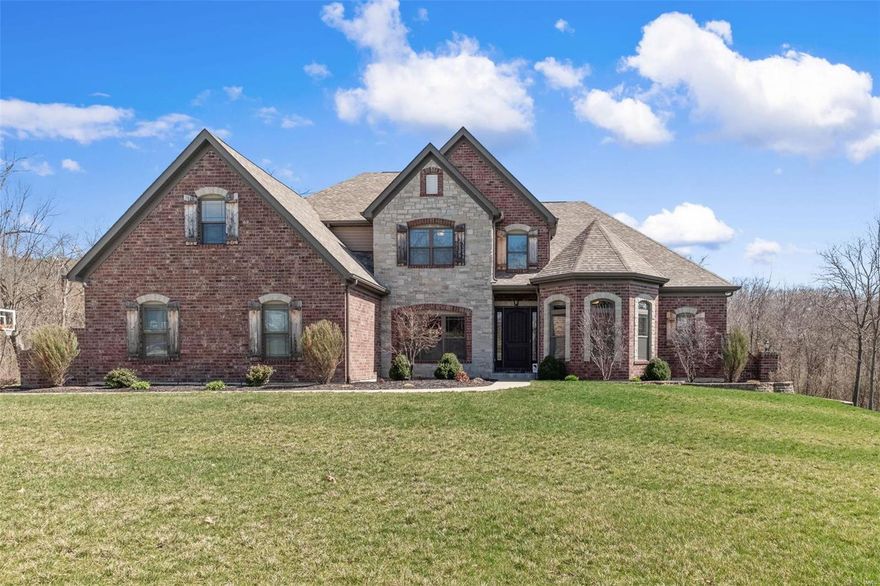 Live your DREAM! 7-yr New CUSTOM BUILT HOME on 3+ Acres backs to Conservation! STUNNING 1.5 Story Walk Out w/ Heated Salt Water Pool & Hot Tub backing to TREES. Step thru the 9’Tall Front Door & be WOW’D by 9’&10’ Ceilings, Handscraped Hardwood & Tile Floors, 8’ Doors, 6” Trim, Crown Molding & Arched Entries. Great Room w/ Fireplace & Built Ins. Chef’s Kitchen w/ 42” Cabinets, Alaskan White Counters, Induction Cooktop w/ Pot Filler & Hood, Double Wall Oven, Island & Breakfast Room. Hearth Room w/ Fireplace. Deck w/ Covered Dining. Family Entry w/ Bench & Cubbies & Laundry. Bright Office, Dining & Half Bath! Main Floor Master Suite w/ Jetted Tub, Tiled Step-In Shower, Dual Sinks, Counter Cabinetry & 2 Walk In Closets. Iron Baluster Stair to 3 Bedrooms, Full & Jack/Jill Bath & Rec Room. 9’ Pour Lower Level w/Tiled Bath & Double Door Shed Entry. 3-CAR 26’ DEEP Garage w/ 8’ Doors! Irrigation, Professional Lighted Landscaping. FRANCIS HOWELL. Wild Horse Ridge is only 6 miles to 40/94!