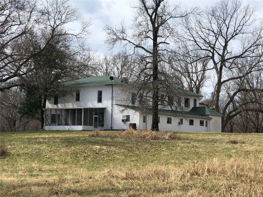 Rare opportunity for a one of a kind private estate in St. Louis County.  Main parcel is approximately 236 acres, partially cleared and partially wooded.  Includes two additional parcels, Locator Numbers 19Y230032 and 19Y630014 which appear to be in the flood plain for a total of 264.64 per St. Louis County records.  Property being sold "as is" seller to do no repairs.  Please submit offers on a Special Sale Contract.  Approximate acreage per St. Louis County records, survey to govern.