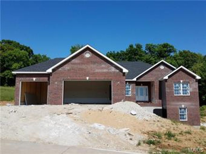 Finally New Construction Available in sought after Eastland Oaks! Located on the East side Washington is this ranch home with a ton of upgrades! This divided floor plan offers a separate master suite with large walk-in closet, double vanity with granite tops, custom tile shower, and a tray ceiling with crown molding! The kitchen offers staggered maple cabinets, soft-close drawers, granite counter tops, stainless appliances, pantry, and breakfast bar! Triple Window in breakfast room allows for plenty of natural light! Vaulted great room with gas fireplace! Wood floor throughout most of the main level! Large laundry room off of the 3-car over-sized garage! Open-staircase to finished lower level! Walk-out lower level offers large family room, bedroom, and full bathroom! Don't forget the covered patio off the breakfast room! All of this on almost an acre lot! Eastland Oaks offers subdivision pool and walking trail!