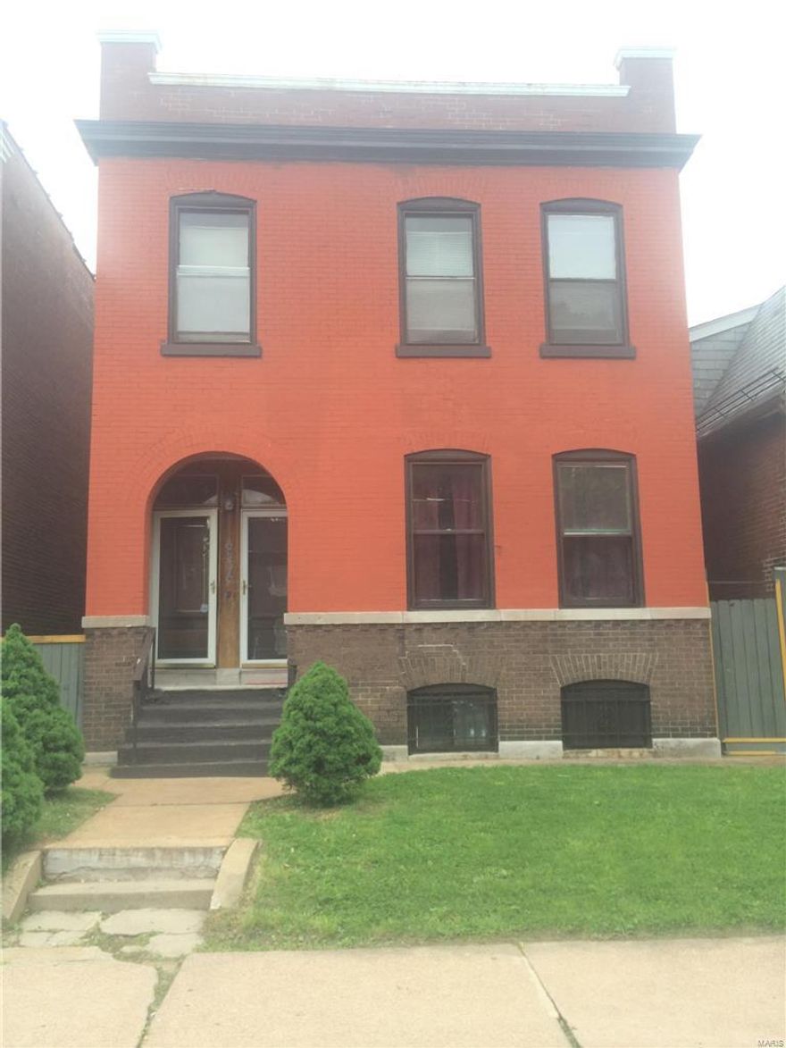 Large brick duplex - 1st floor has two large bedrooms, eat in kitchen, sitting room / hall office and a big living room.  2nd floor unit has 3 bedrooms, eat in kitchen, living room and a enclosed porch off the kitchen.  Electric units.  Both apartments have recently passed a city conservation inspection and are cleared for occupancy.  1st floor unit is currently rented.  Two car parking pad in the rear.  View of Mt. Pleasant park from the front porch.