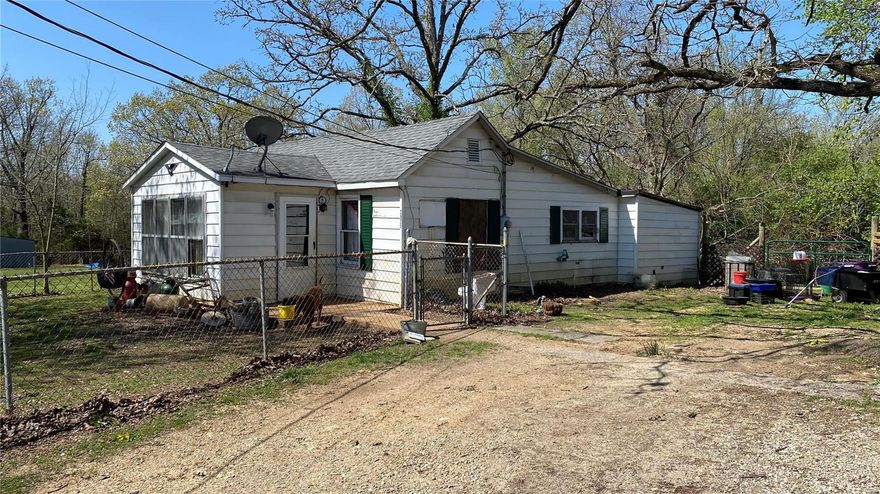 Are you looking for a steel of a deal with land? Over 7+ Acre's that's mostly wooded with road frontage off 221. On the back acreage sits a 2 Bed, 1 Bath home that's charming and could all yours!!! Some TLC maybe needed, but that's your preference. There are 2 wells and the option of county water. A 2 car shop with electric sits at the front of the back acreage right off Chalk Hill and would be great for the tinker or fixit man/woman looking to swing a side hustle or do full time mechanics. This is a great place for a mini farm too. With the 2 wells to help water the animals and the cleared off land you have the means to start off strong with your mini farm dreams. The extra storage shed near the home also has eclectic and works great for chickens or fowl. when viewing the property the Tuckey pin doesn't stay. Also Beware of BIG DOGS, Do NOT just enter the gated yard. Appointment is Required for viewing. No inside photos until seller moves.