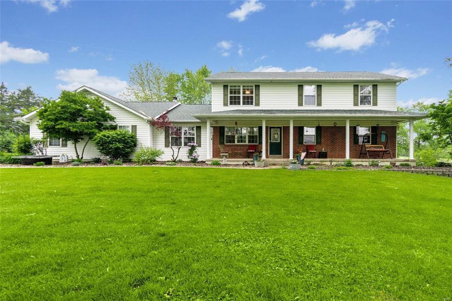 NEW PRICE! Country Living at it's finest in amazing location on 4.7 acres! 1.5 Story home w/4 beds & 4 baths is spacious yet cozy w/over 3000 sq. ft of total living space. Newly finished outbuilding w/electric, water, loft area & separate 2 stall barn. Tall oaks, lush lawn, flat ground for the green pasture w/a working water spout & fencing make this the ideal property to bring your horses or ATVs. Step inside the entry foyer & be greeted w/hardwood flooring on the main level. Office/den area & sep dining/living area. Main floor master ste w/walk-in closet & bath w/dual vanity & walk-in shower. Spacious kitchen & breakfast room w/breakfast bar. French doors out to patio. Family room w/wood-burning fireplace. Main floor laundry. Upstairs includes loft area, 3 addl bedrooms w/walk-in closets & a full bath w/sep tub & shower. Lower level finished w/large rec room, sleeping area/storage & half bath. Walk-out to patio area. Convenient access to Hwy 70 & in the Wentzville School District!